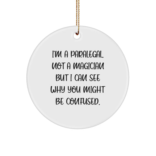 Funny Paralegal Gifts from Friends for Christmas, Circle Ornament with a Twist, 'I'm A Paralegal. Not A Magician...' - Image 1