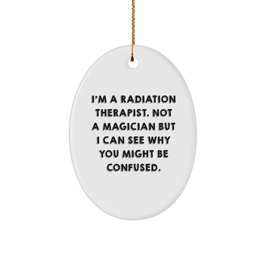 Radiation Therapist Gifts for Men, 'I'm Not A Magician' Oval Ornament, Funny Christmas Memorable Present from Friends - Image 1