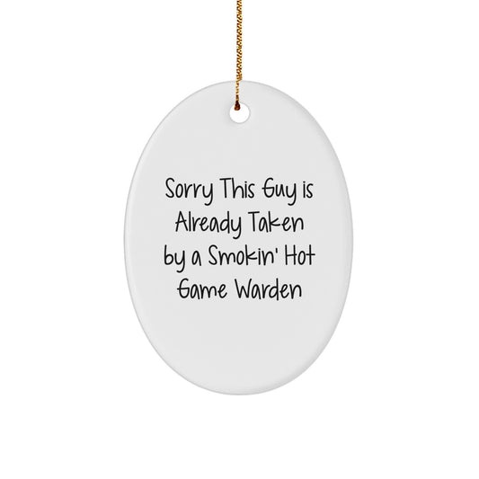 Funny Game Warden Gifts from Friends, Unique Oval Ornament for Christmas with 'Sorry This Guy Is Already Taken By A Smokin' Hot Game Warden', Men Women Family Coworkers - Image 1
