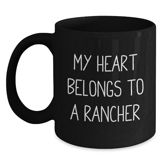 Funny Inspirational Gifts for Rancher from Family, Friends, or Coworkers - Black Coffee Mug 'My Heart Belongs To A Rancher' Christmas Unique Presents - Main