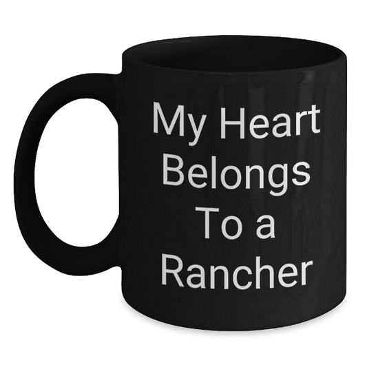 Funny Rancher Gifts for Christmas - My Heart Belongs To A Rancher Black Coffee Mug from Friends - Main