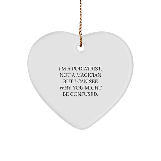 Funny Podiatrist Gifts from Friends for Men, 'I'm A Podiatrist. Not A Magician' Heart Ornament for Christmas - Image 1