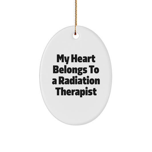 Funny Radiation Therapist Gifts from Friends, Oval Ornament with 'My Heart Belongs To A Radiation Therapist' Quote for Christmas - Image 1