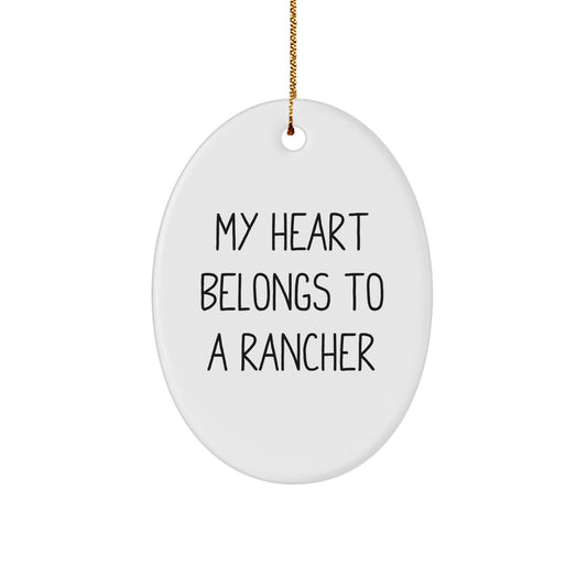 Funny Rancher Gifts, Oval Ornament for Men Women Friends Coworkers, My Heart Belongs To A Rancher Christmas Unique Presents - Image 1