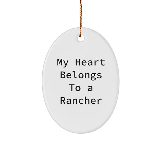 Funny Rancher Oval Ornament Gifts for Him, Gift from Men, Unique Christmas Unique Gifts for Rancher Friends, 'My Heart Belongs To A Rancher' Oval Decoration - Image 1