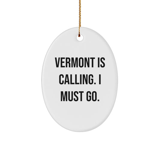 Vermont Gifts from Friends and Family - Oval Ornament with 'Vermont Is Calling. I Must Go.' Quote, Perfect for Christmas - Image 1